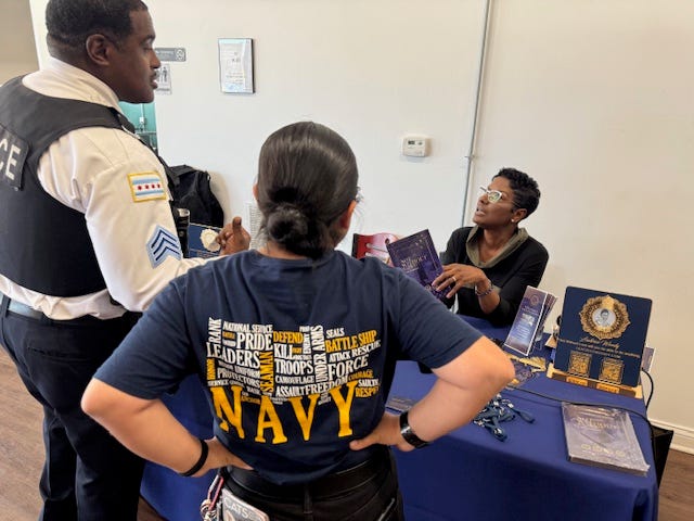 Leatrice Woody meets with visitors at her community event
