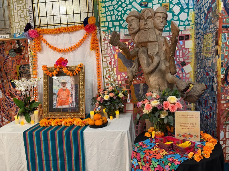 An altar set up to honor the late Isaiah Zagar at the Philadelphia Magic Gardens.