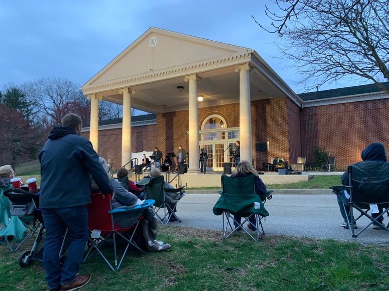 A socially distanced crowd gathers at Lakeview Memorial Park in Cinnaminson, New Jersey for a sunrise Easter service.
