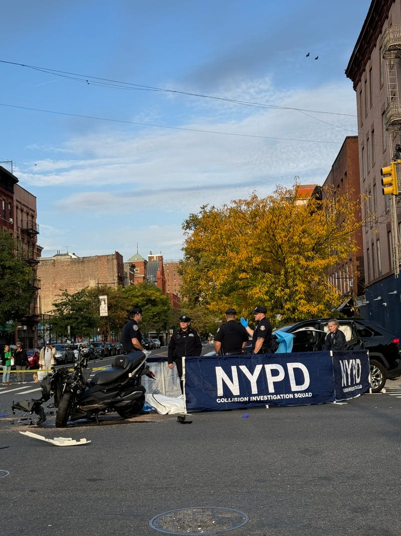 An SUV collided into a scooter in East Harlem early Sunday morning, killing a man and woman.