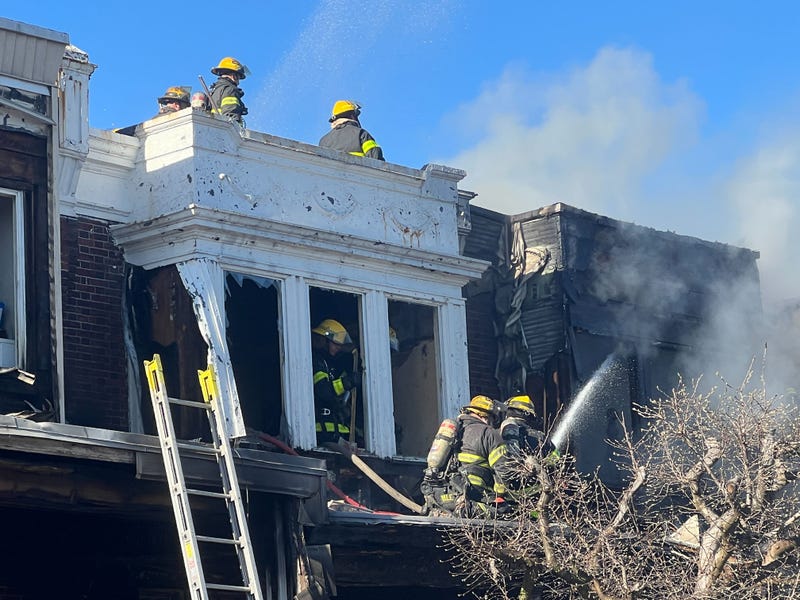 Firefighters battle house fire