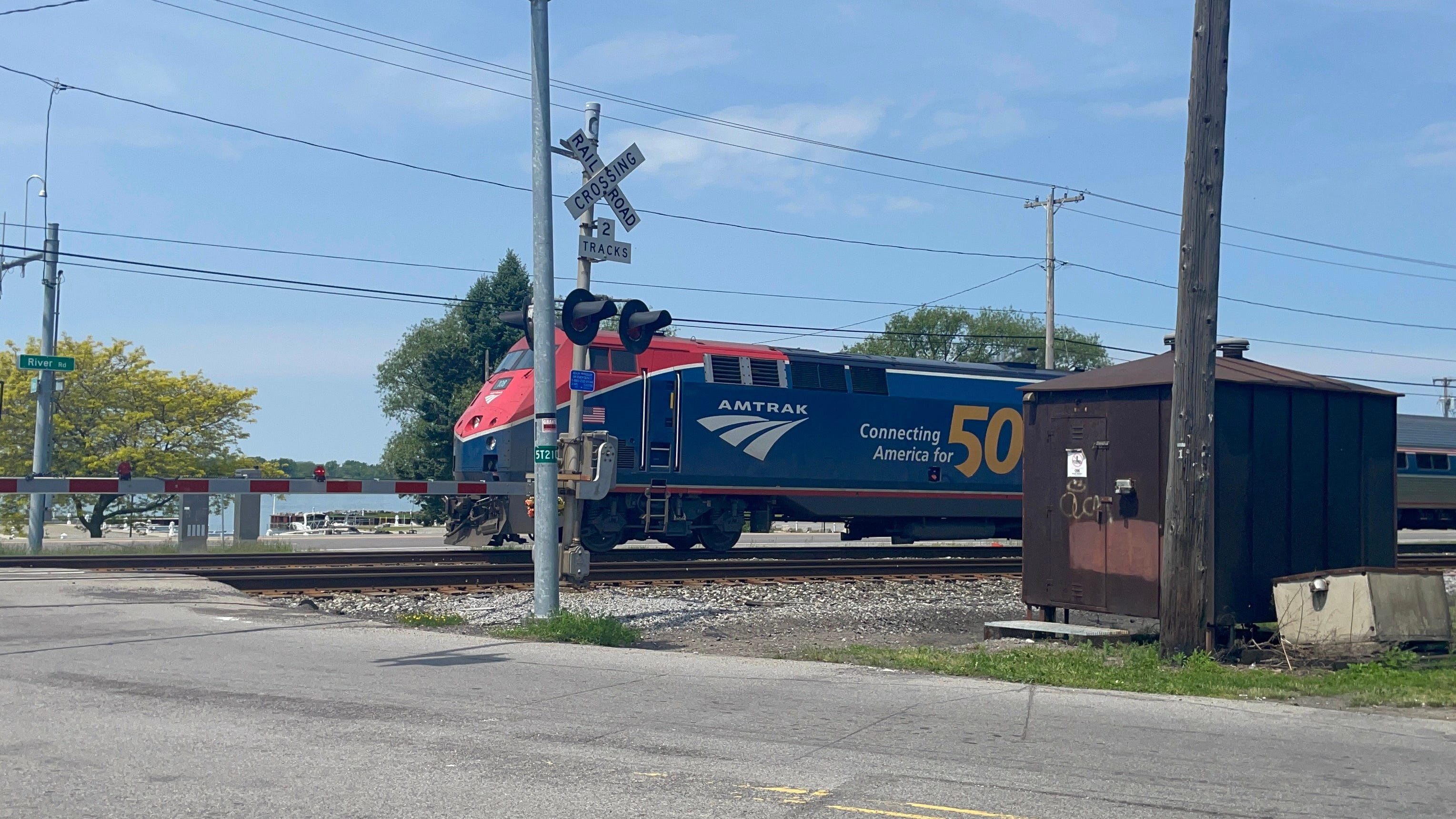 Exploring railroad crossing safety, timing of barriers dropping before trains pass through