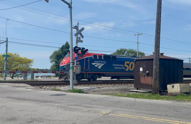 Amtrak train through Felton Street railroad crossing