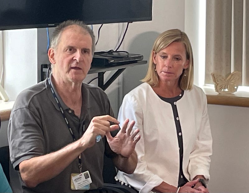 Peter Canning, RN, EMS Coordinator at UConn Health, with Maria Coutant Skinner, CEO of McCall Center for Behavioral Health in Waterbury, 8/23/22