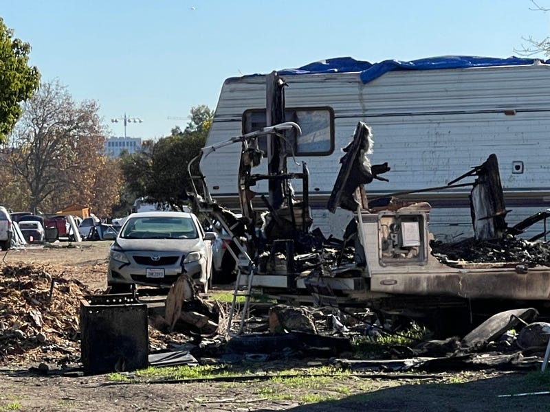 Remnants of an RV torched by a propane tank explosion.