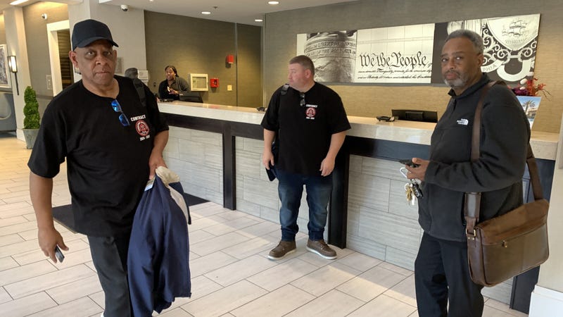Negotiators from Transport Workers Union Local 234, including union president Brian Pollitt (right), arrive at the Wyndham Philadelphia Historic District Hotel on Thursday, Nov. 7 for last-minute contract talks with SEPTA.