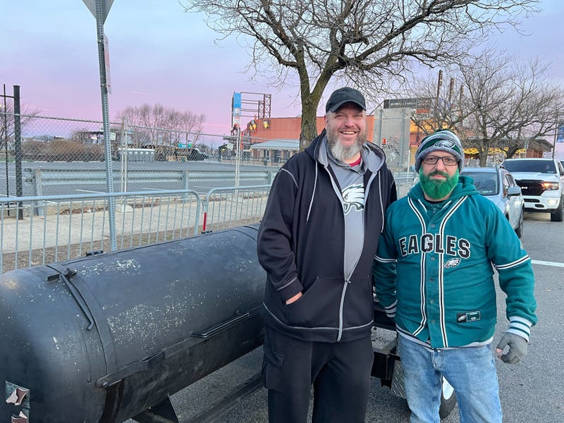 two men at tailgate
