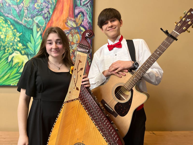 Olesia Skorets and David Kozyrkov, performers with the String Theory Charter School marking one year since Russia's invasion of Ukraine.