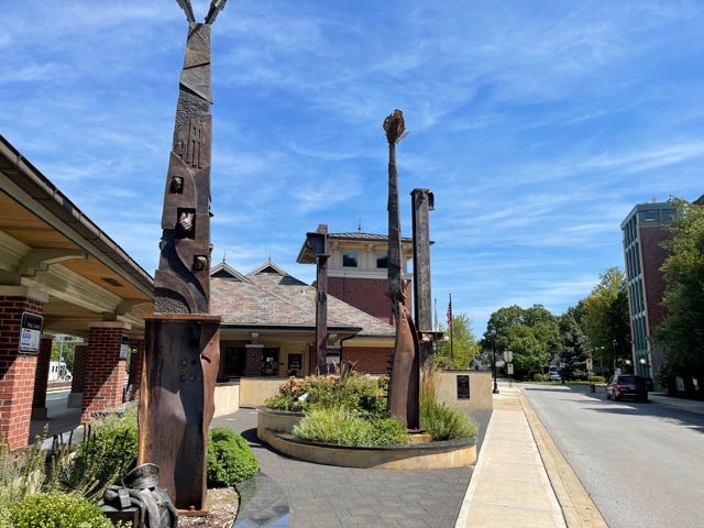 Wedged between 95th Street and Museum Drive and behind the Metra Station, an installation that incorporates four, 22-foot beams of World Trade Center Steel.