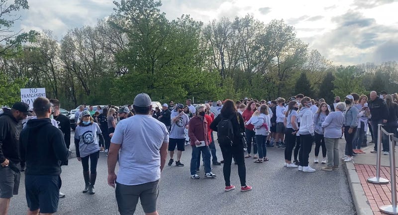 Supporters of Eric Kasperowicz rally outside Pine-Richland district offices Monday
