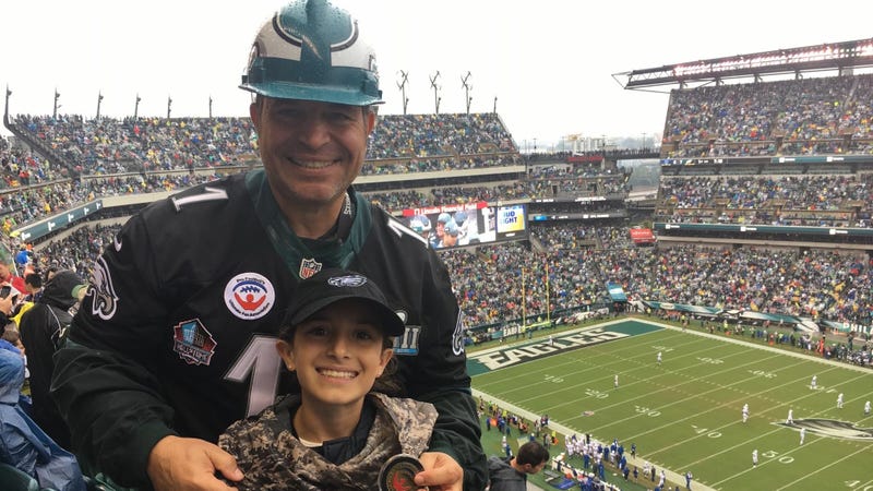 Kenny Justice and his son at an Eagles game at Lincoln Financial Field.