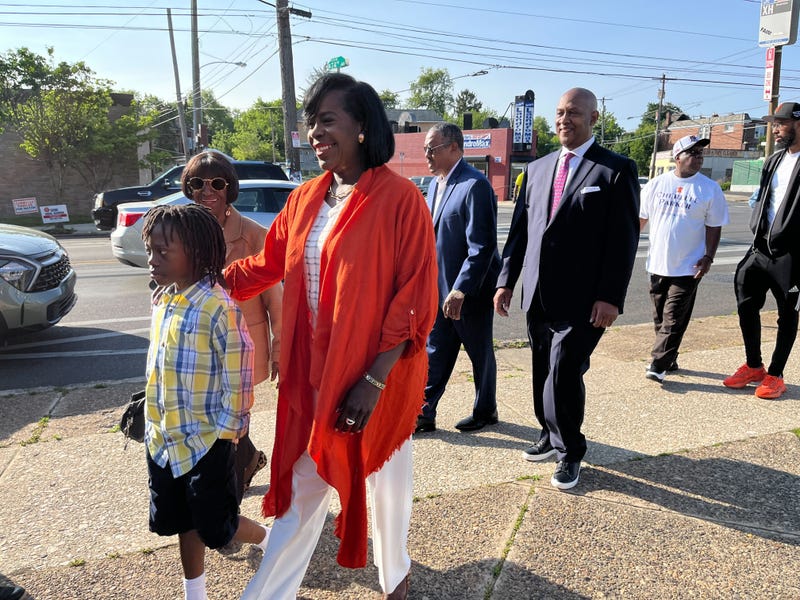Cherelle Parker arrives at a polling place with her son and other family members to vote in the mayoral primary, May 16, 2023.