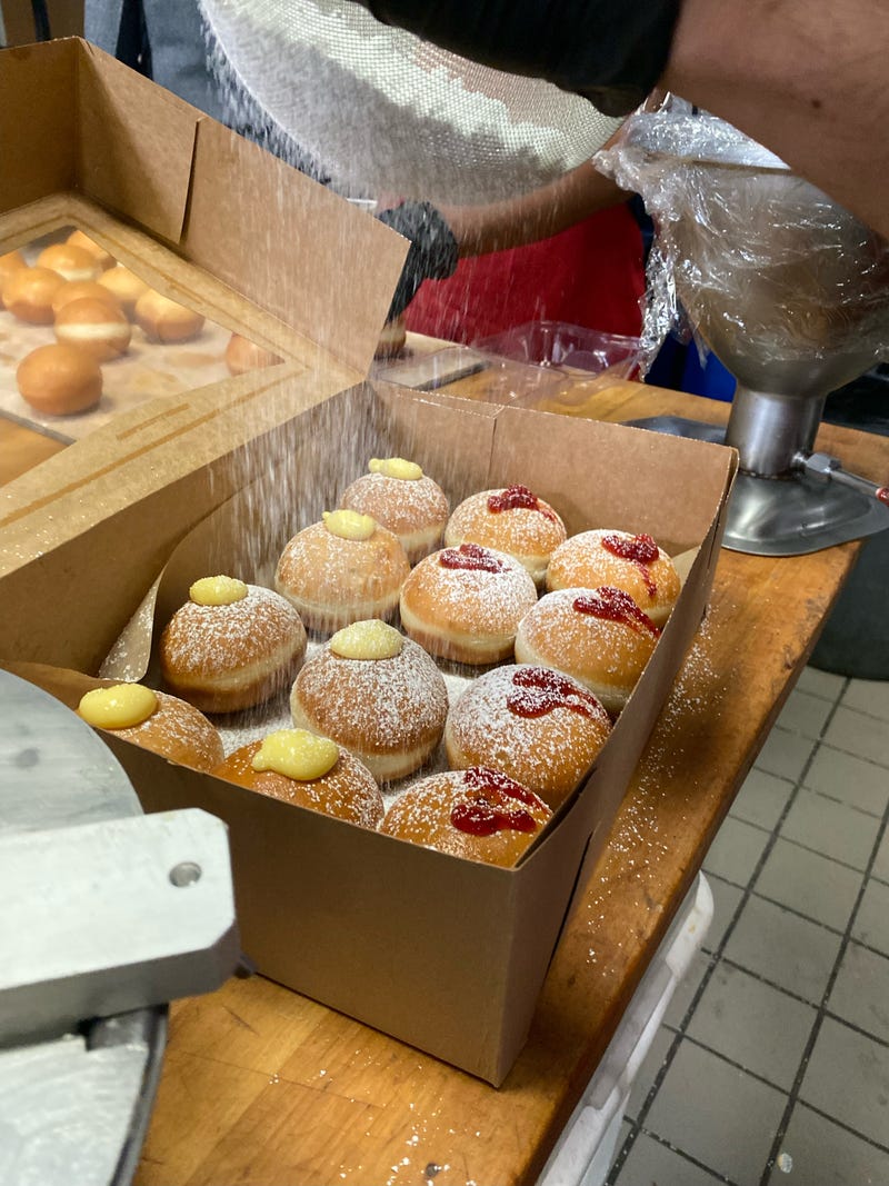 Co-owner Isaac Yosef not only showed me how the donuts are made, he also gave me some insight as to why they are a part of the Hanukkah celebration.