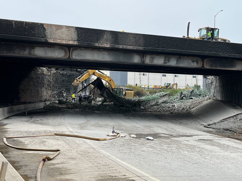 Crews remove rubble and debris from the I-95 overpass collapse, June 12, 2023.