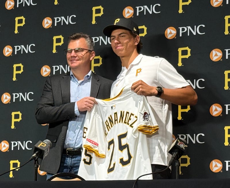 Seth Hernandez with Ben Cherington with jersey