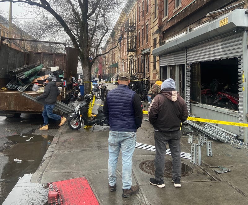 People were seen clearing debris outside the shop