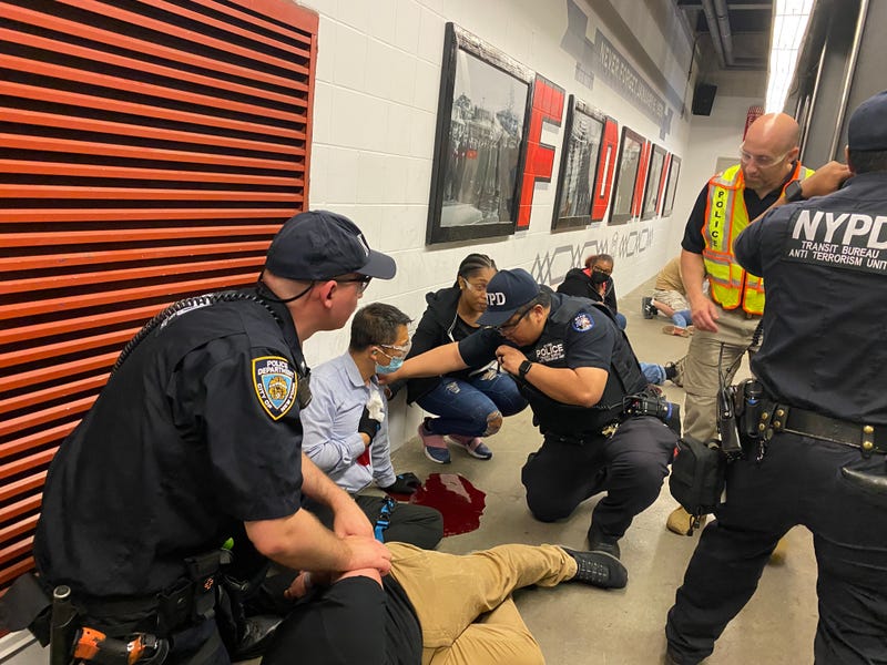 Members of the NYPD Transit Bureau's Anti-Terrorism Unit attend to a person pretending to be bleeding out during a training exercise on Thursday at the FDNY Training Academy on Randall's Island.