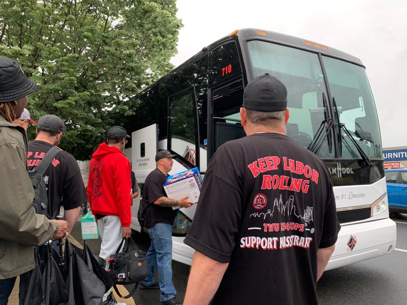 Transport Workers Union Local 234 members board buses in Penn's Landing to participate in a transit funding rally in Harrisburg, May 13, 2025.
