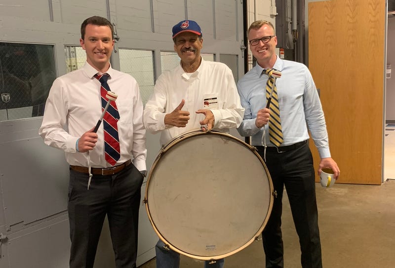 Cleveland drummer John Adams (center) poses for a picture with 92.3 The Fan's Jon Rudder (left) and News 5 meteorologist Trent Magill (right).
