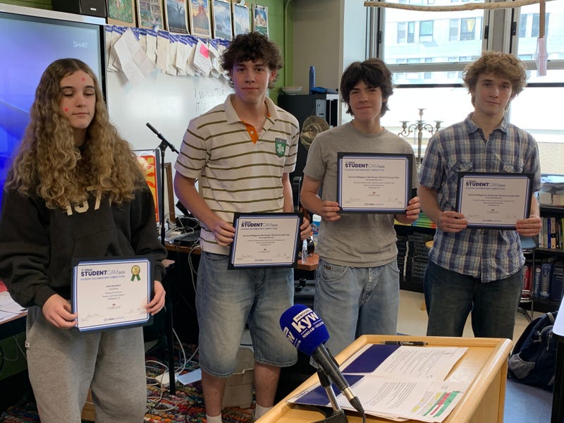 Science Leadership Academy juniors (from left) Ione Saunders, Desmond Maggione, Nati Roemer-Block, and Jaiel Lapp Yoder accept awards for their entries in C-SPAN's annual StudentCam contest.