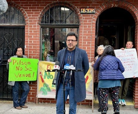 Ald. Byron Sigcho Lopez (25th) speaks to the media outside of Chela's Gift Shop, located at 1512 W. 18th Street, on March 25, 2024.