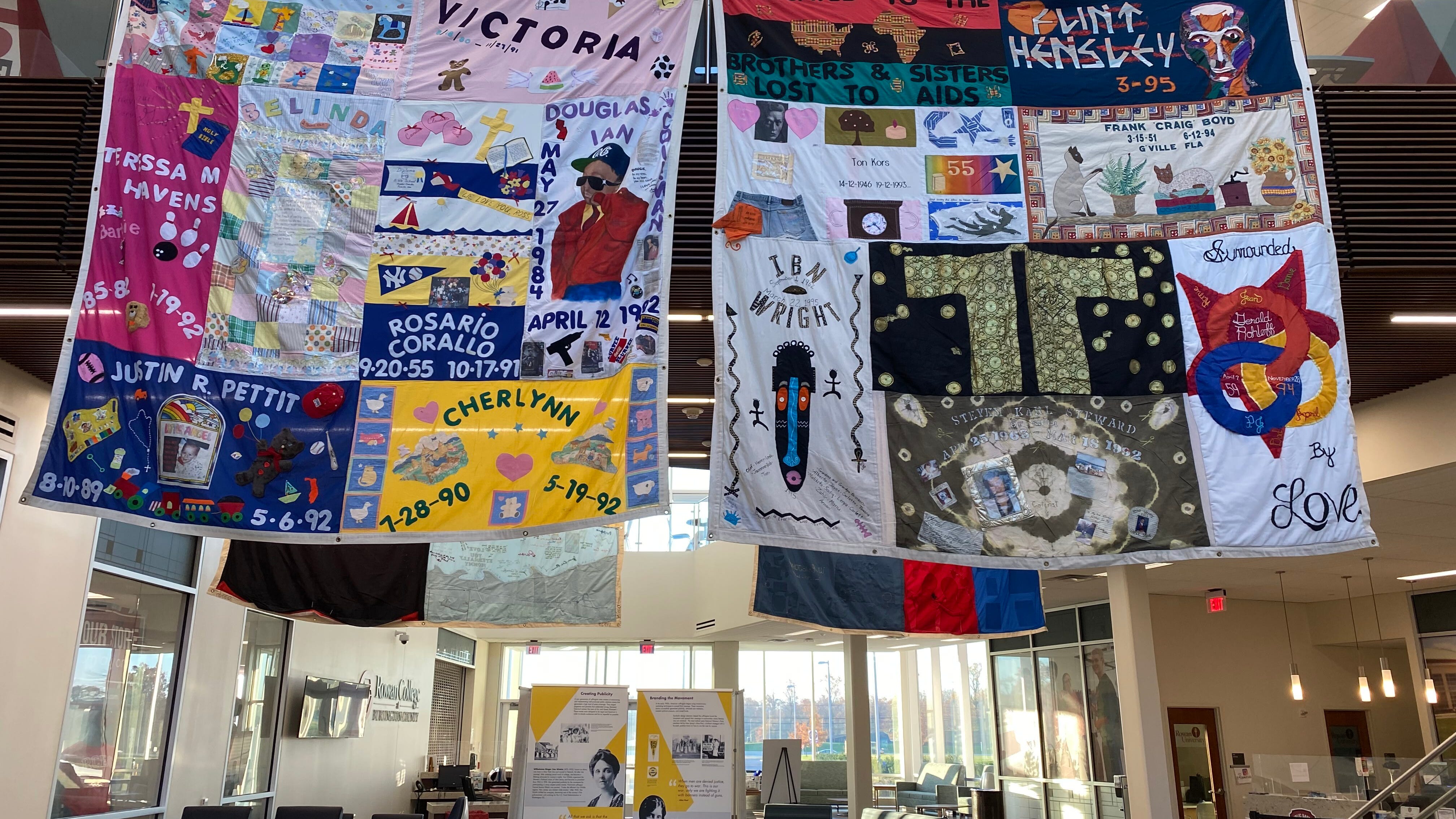 Several panels of National AIDS Memorial Quilt on display at Rowan College