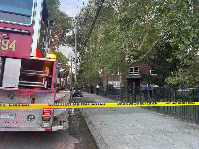 Fire truck in front of house fire investigation scene