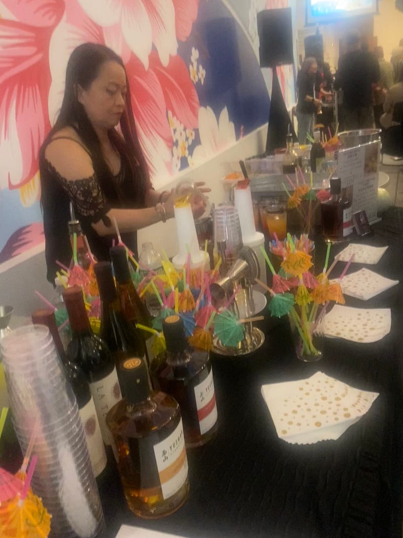 Mixologist Eva Kuo serves Taiwanese drinks at "Tunes from the Islands" on April 30, 2024.