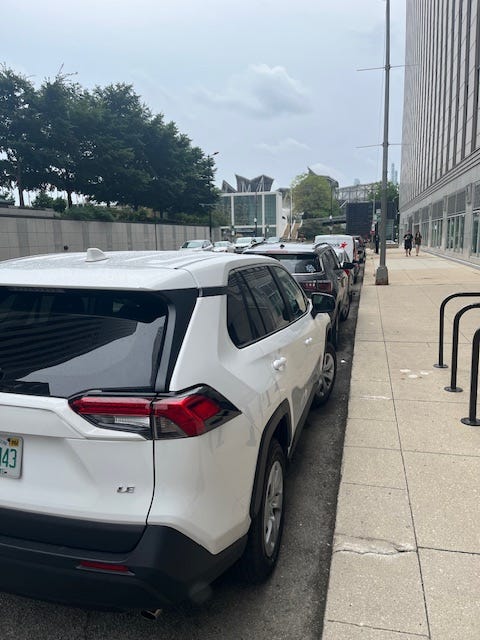 Cars parked on North Stetson Avenue in Chicago.