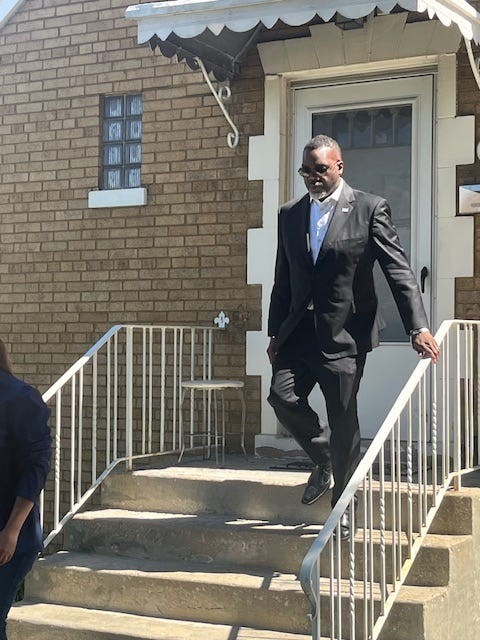 Chicago Mayor Brandon Johnson leaves a house in Chicago's Archer Heights neighborhood.