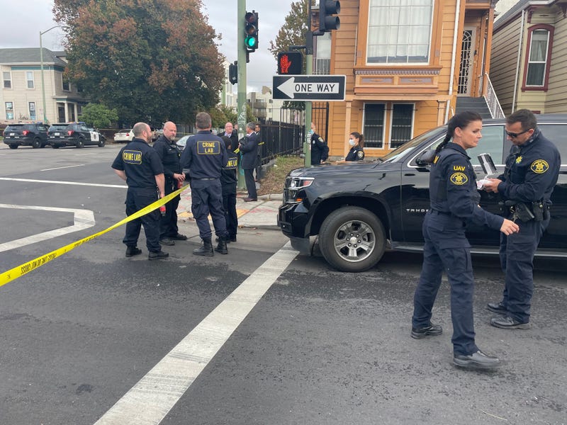 Oakland police officers block off gas station where a former officer was shot on Thursday afternoon.