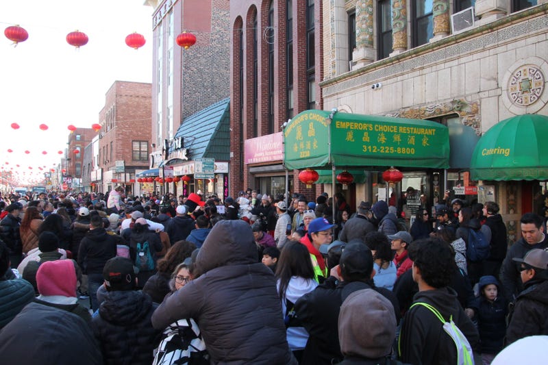 Throngs of people descended upon Chinatown streets and businesses on Sunday for the annual Lunar New Year parade and celebration.