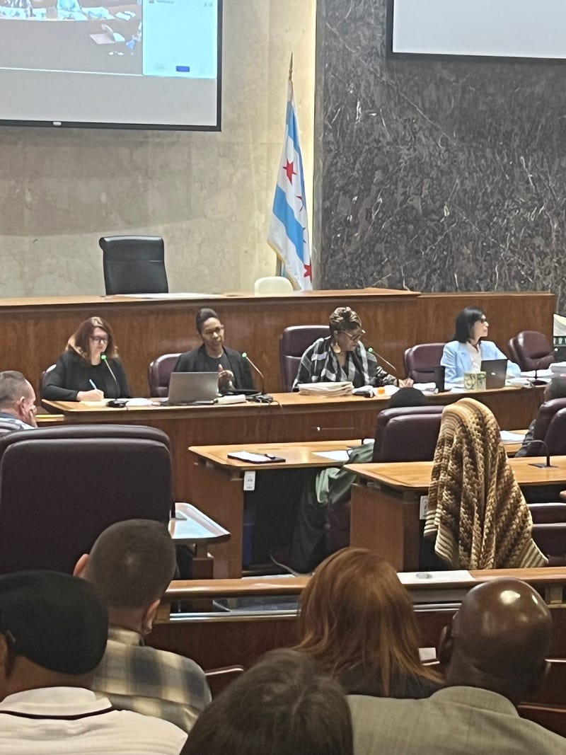 Chicago Corporation Counsel Mary Richardson-Lowry (second from left) answers aldermen's questions during a meeting of the Chicago City Council Finance Committee.
