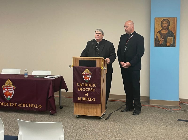 Bishop Michael Fisher and Fr. Bryan Zielenieski