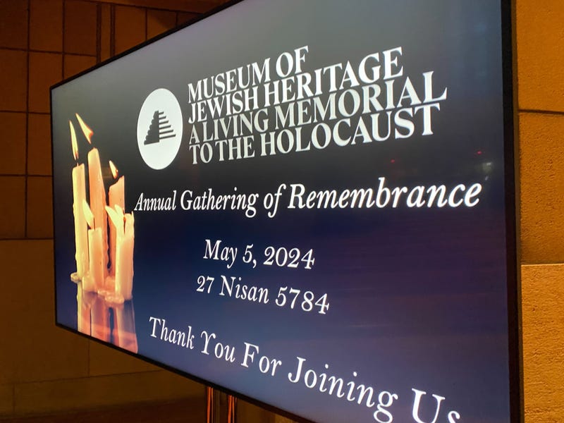 A sign in the main sanctuary at Temple Emanu-El on the Upper East Side on May 5, 2024 for the Museum of Jewish Heritage: A Living Memorial to the Holocaust.