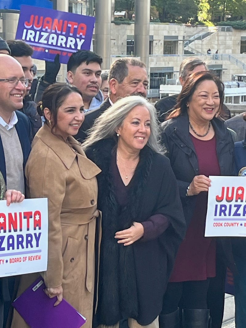 Former Friends of the Parks executive director Juanita Irizarry (center) after announcing her candidacy for Cook County Board of Review.