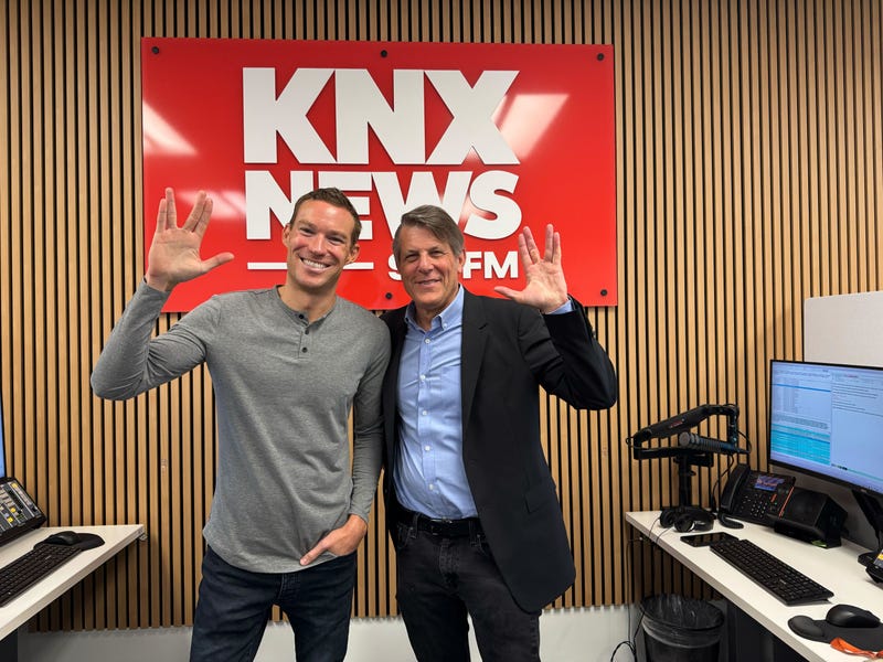 KNX News 97.1 FM's Mike Simpson with Adam Nimoy. 