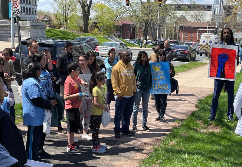 Hartford Public Schools parents and children rally on the state Capitol lawn, seeking funds to close a budget gap that's causing layoffs, 4/24/24