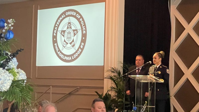 Philadelphia Fraternal Order of Police Lodge No. 5 President, John McNesby, Police Commissioner Danielle Outlaw at an FOP memorial event for fallen police officers.