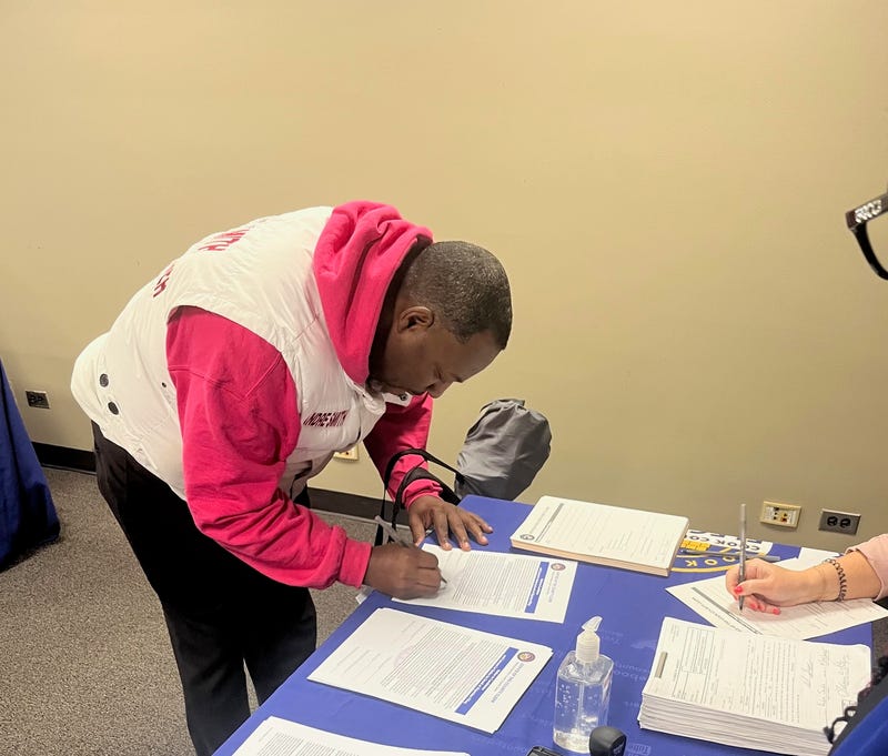 Andre Smith files petitions to get on March's primary ballot for Cook County Commission. He was the first person in line on this first day to file petitions.