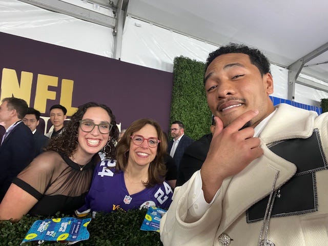 Viking Fan of the Year Betsy Fine (center) with her daughter Abbi (left) and Viking safety Cam Bynum at the NFL Honors Red Carpet.