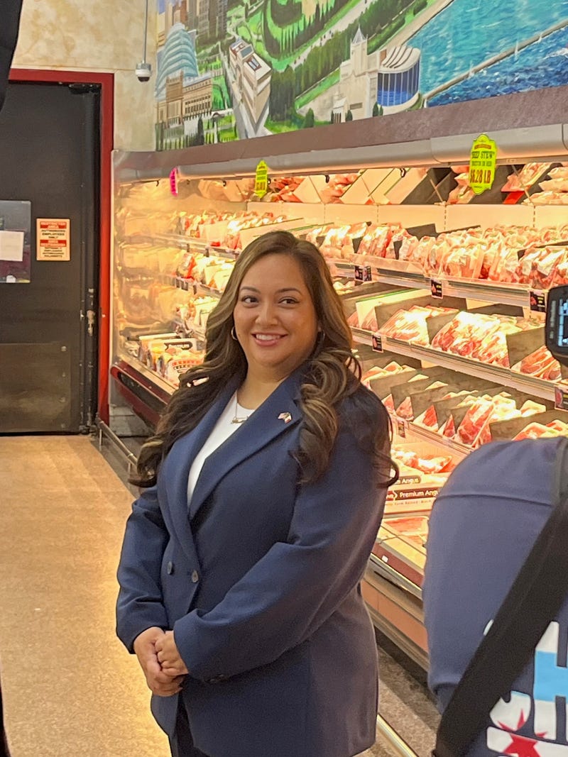 Democratic Congressional candidate Patty Garcia poses for pictures before formally launching her 4th District campaign at a grocery store in the Town of Cicero.