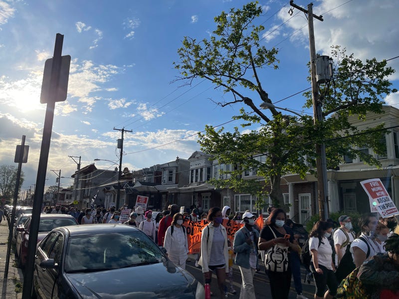 A commemorative march for victims of the 1985 MOVE bombing.