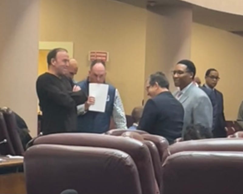 Chicago aldermen (from left) Brendan Reilly (42nd), Matt O'Shea (19th), Scott Waguespack (32nd) and Jason Ervin (28th) confer during a City Council Finance Committee meeting November 17, 2025.