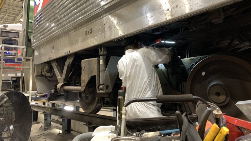 A technician inspects a Silverliner IV Regional Rail car at SEPTA's Overbrook maintenance facility on Thursday, Oct. 9.