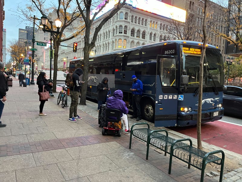 A Greyhound bus stops at Sixth and Market streets, Nov. 9, 2023.