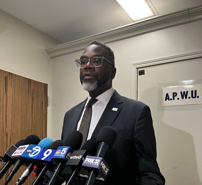 Chicago mayor Brandon Johnson answers questions after an appearance at American Postal Workers Union Local 1 headquarters on Chicago's South side.