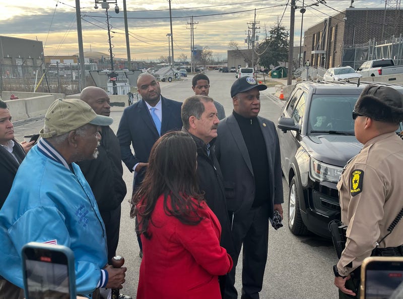 Members of Chicago's Congressional delegation talk to an Illinois state trooper about their plan to visit the ICE facility in Broadview.