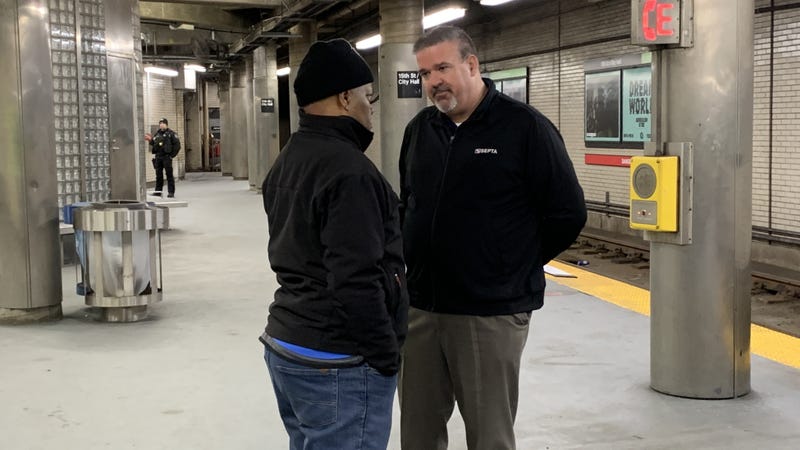 SEPTA General Manager Scott Sauer (right) greets a trolley commuter at 15th Street Station in Center City on Tuesday, Jan. 13.