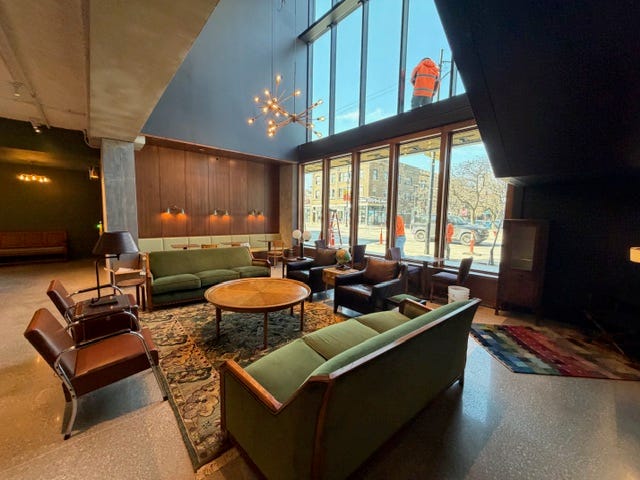 The view in the 2 story lobby looking over Broadway inside the new Timeline Theater 